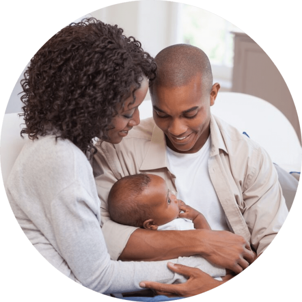 happy-parents-spending-time-with-baby-couch_13339-243138 (1)-modified-min
