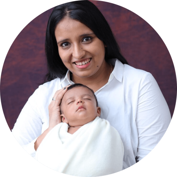 portrait-smiling-young-woman-with-her-new-born-baby-wrap-white-swaddle-blanket_1048944-25950095 (1)-modified-min